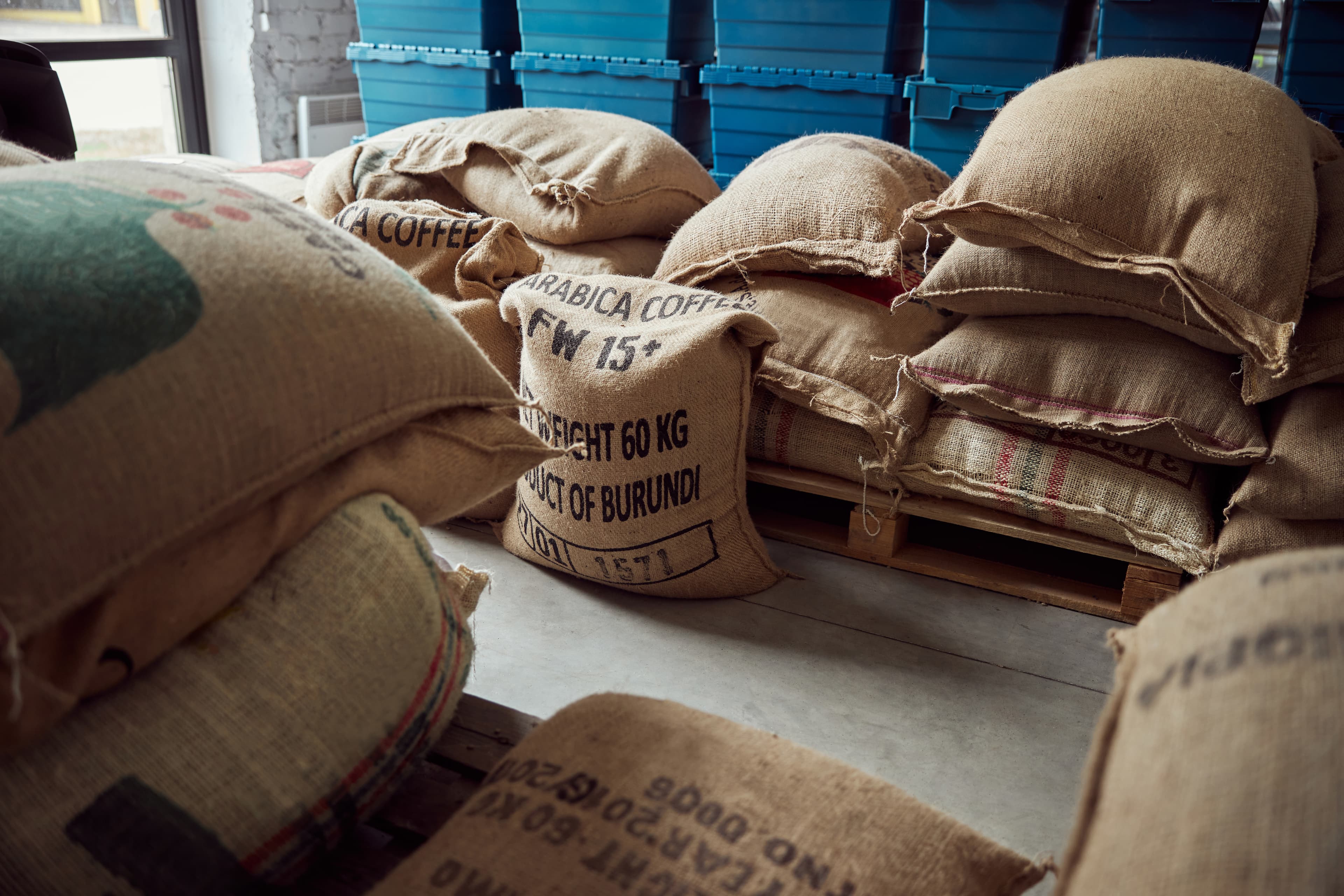 Printed hessian coffee sacks stacked in an export warehouse