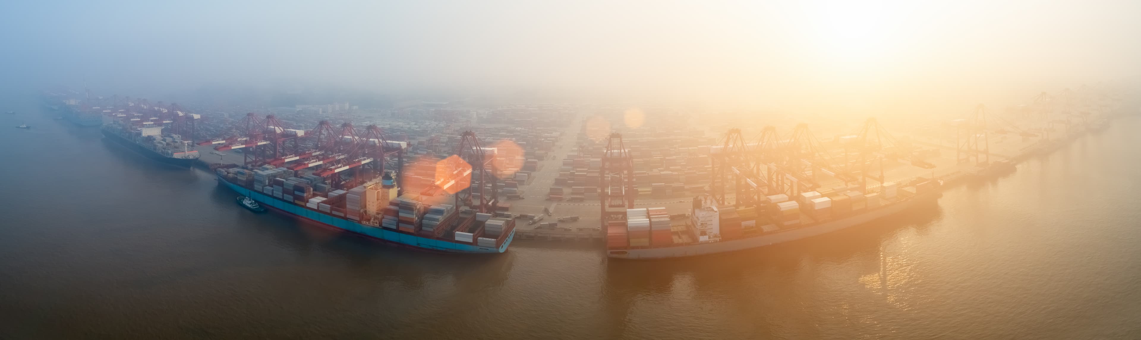 International container terminal at sunrise